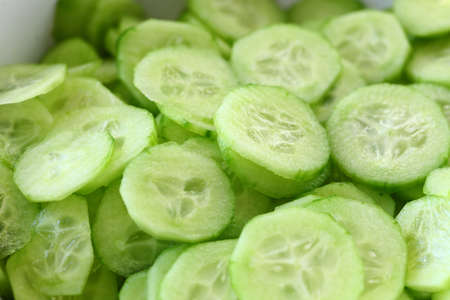 background with slice cucumbers salad green foodの写真素材