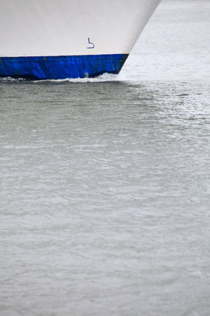 Tug boat bow creating spray outdoor sea - Cruise ship detailsの写真素材