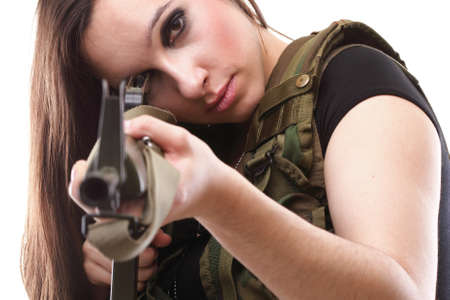 Beautiful woman with rifle plastic Military Army girl Holding Gun white isolated backgroundの写真素材