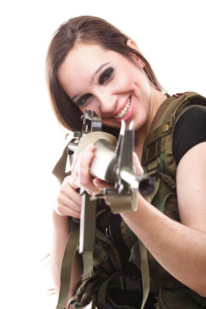 Beautiful woman with rifle plastic Military Army girl Holding Gun white isolated backgroundの写真素材