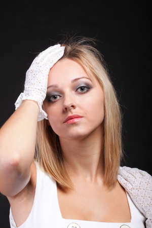 picture of beautiful woman in white gloves black backgroundの写真素材