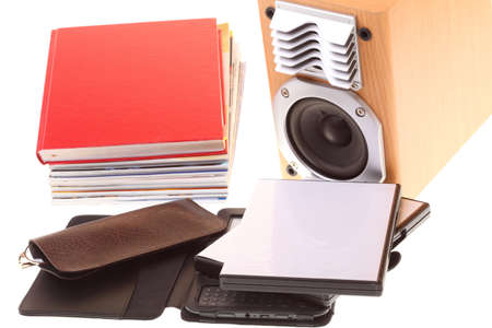 eBook reader pile of books, isolated on white multimedia black audio speakerの写真素材