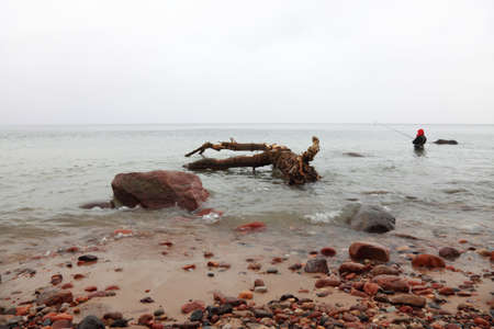 Fisherman Stones in sea water autumn in Orlowo, Gdynia Polandの写真素材