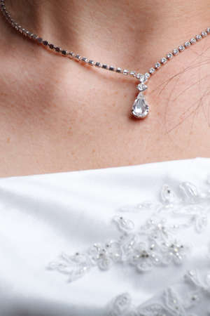Chest of beautiful bride wearing pearl Necklaceの写真素材