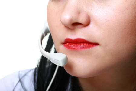 young brunette girl with headphones isolatedの写真素材