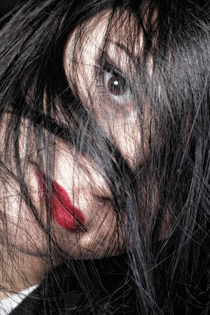 beautiful brunette woman with long hairの写真素材