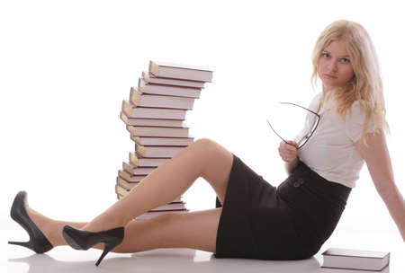 girl with book - Beautiful young woman with books isolated on a white backgroundの写真素材