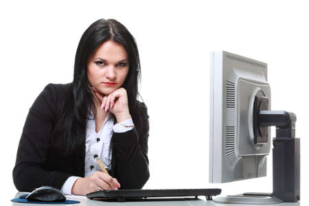 modern business woman sitting at office deskの写真素材