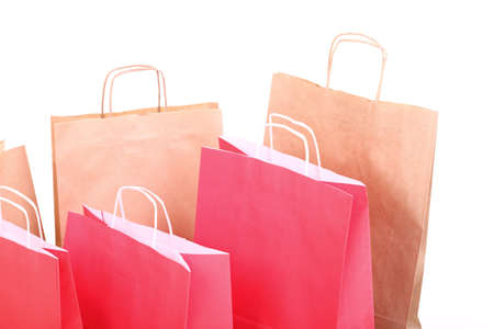Shopping red eco gift bags isolated on white backgroundの写真素材