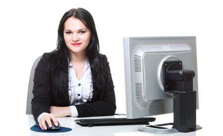 modern business woman sitting at office deskの写真素材