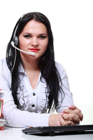 young brunette girl with headphones isolatedの写真素材