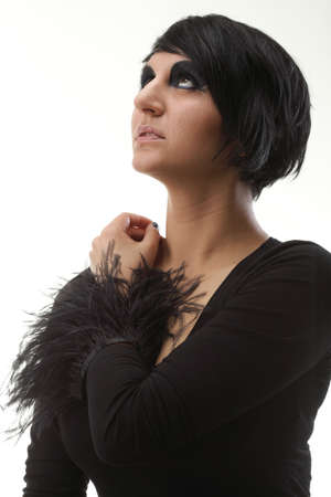 Beautiful woman posing in studio. white background. Portrait Professional make up and hair style.の写真素材