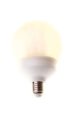 Energy saving fluorescent light bulb isolated on a white background.の写真素材