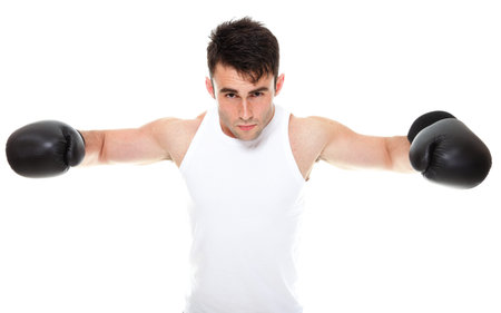Sport health studio picture from a young boxer isolated on white