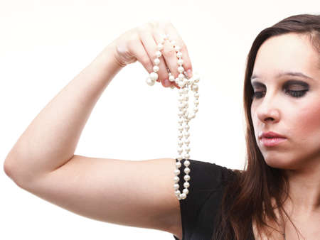 Sexy young woman and pearl isolated on whiteの写真素材