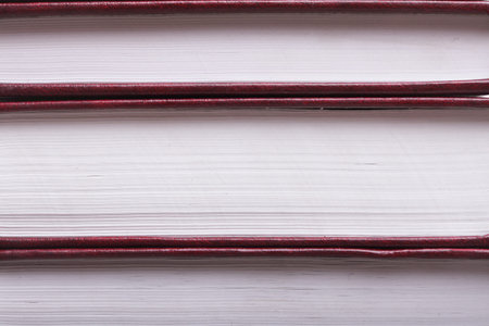 books on book shelf background stack red book library object