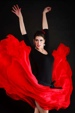 Art  Sexy spanish girl attractive woman in red long skirt dancing flamenco traditional dance の写真素材