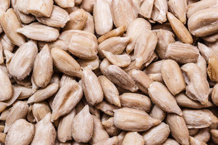 Whole food. Closeup sunflower seeds as background textureの写真素材