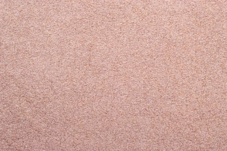 Macro bright beige suede soft leather as texture backgroundの写真素材