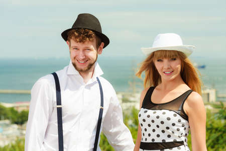 Summer holidays love relationship and dating concept - romantic happy couple retro style outdoorの写真素材