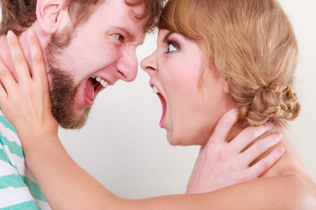 relationship difficulties. Angry woman and man yelling at each other. Face to face. Fury couple