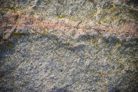 Background of natural stone solid wall texture patternの写真素材