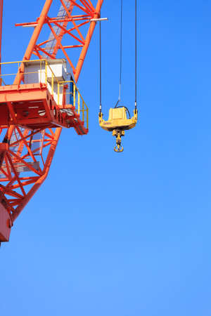 Business and commerce. Cranes at port area and blue sky, cargo container yard. Industrial sceneの写真素材