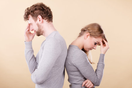 Depression and sadness concept. Unhappy depressed couple after argument. Sad woman and disappointed...