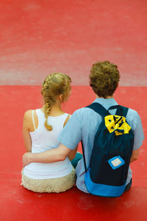 Young boy and girl sitting together.の写真素材