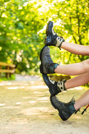 Couple having fun waving legs.の写真素材