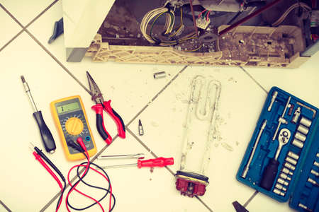 Machine industry repair mechanical concept. Tools with washing machine.の写真素材