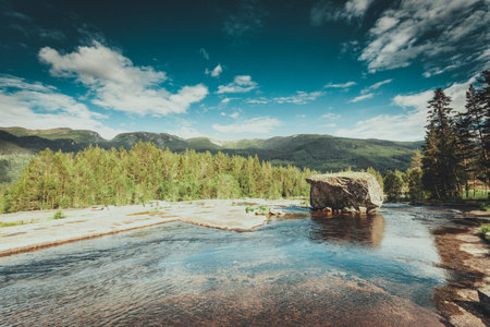 Beautiful view of norwegian mountain river in summer.