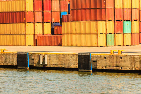 Various containers waiting in port. Cargo goods in harbour. Commerce transport maritime shipping...