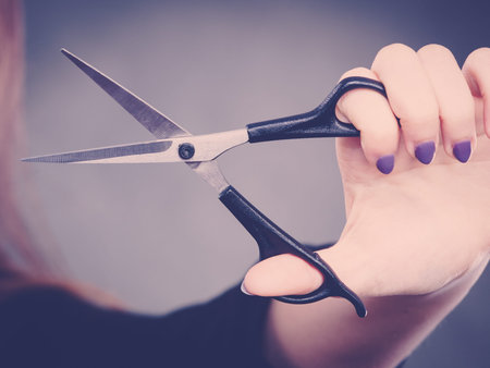 Cutting and trimming. Haidressser with vision of new look her client. Professional woman hairdresser...