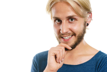 Happy young man portrait, stylish bearded male smiling, isolated on whiteの写真素材