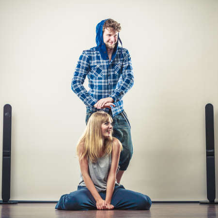 Two modern dancers couple woman and man dancing. Urban lifestyle. Hip-hop generation.の写真素材