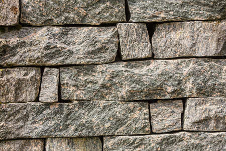 Bright background of brick stone wall texture pattern layout.の写真素材