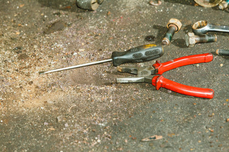 Mechanical automotive fixing engineering industry concept. Pliers, wrench screwdriver on table....