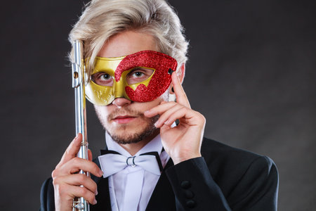 Holidays, people and celebration concept. Elegant young guy wearing suit white shirt bow tie and...