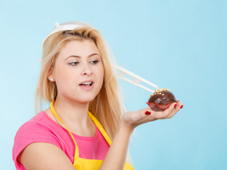Woman with cupcake