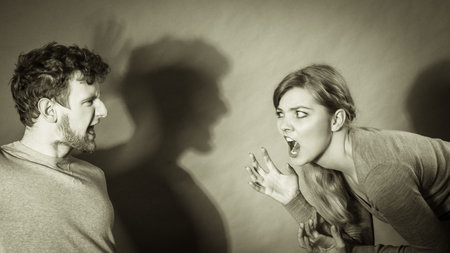 Negative emotions concept. People in fight. Husband and wife arguing and yelling on each other....