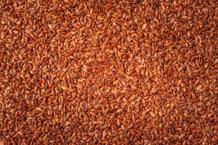 Healthy diet organic nutrition. Brown raw flax seeds linseed as natural food background
