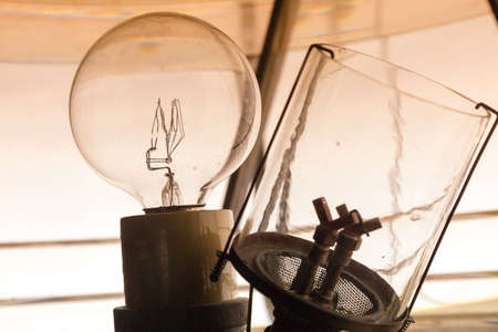 Closeup inside of old lighthouse showing the light bulb interior.の写真素材