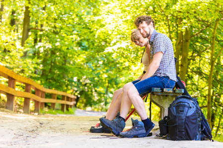 Couple of backpackers outdoorの写真素材