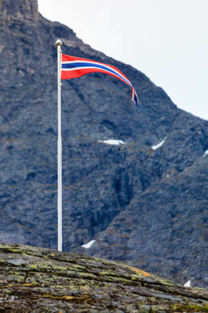 Norwegian flag outdoor on nature, in stone mountainsの写真素材