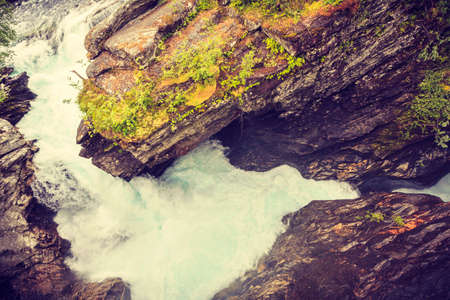 Tourist attraction in Norway, Europe. Gudbrandsjuvet waterfalls located in the Valldalen valley, between Valldal and Trollstigenの写真素材