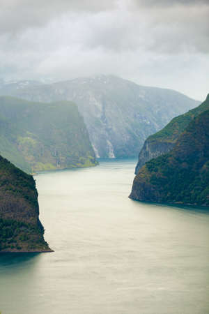 Tourism and travel. Scenic nature landscape. View to picturesque Aurlandfjord and Sognefjord from Stegastein viewpoint, Norway Scandinavia.の写真素材