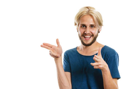 Concept of joy, positive emotion. Happy joyful young man, stylish bearded male smiling laughing, pointing with fingers, isolated on whiteの写真素材