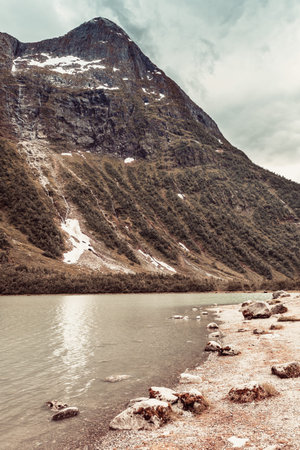 Mountains and lake landscape in Fjaerland area, Sogndal Municipality in Sogn og Fjordane county, Norway.の写真素材