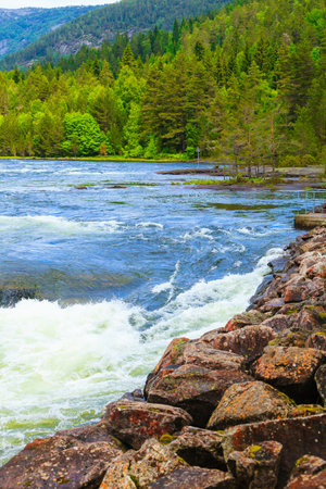 Beautiful view of norwegian mountain river in summer.